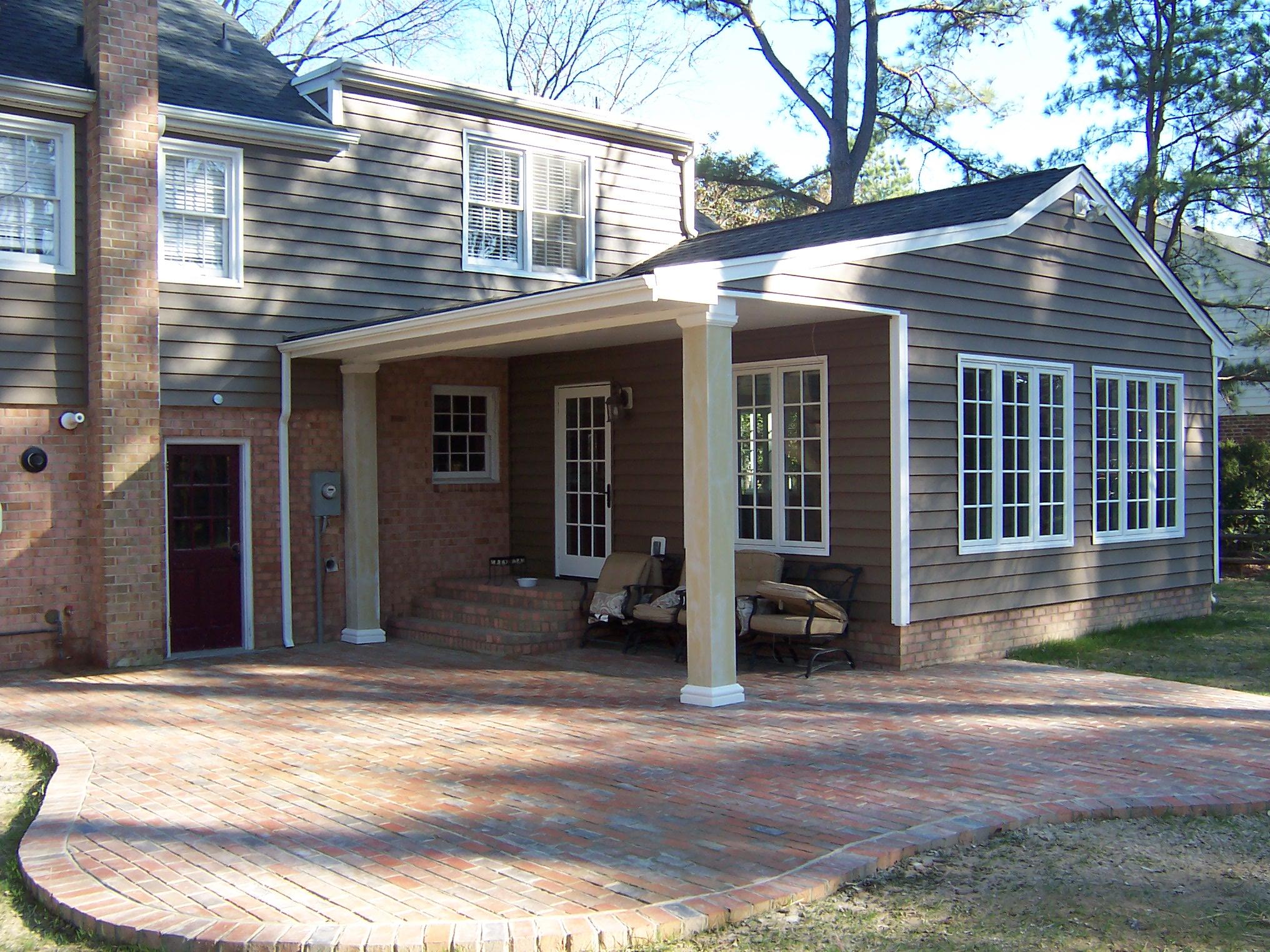 Addition with brick patio, complete kitchen remodel, and renovations