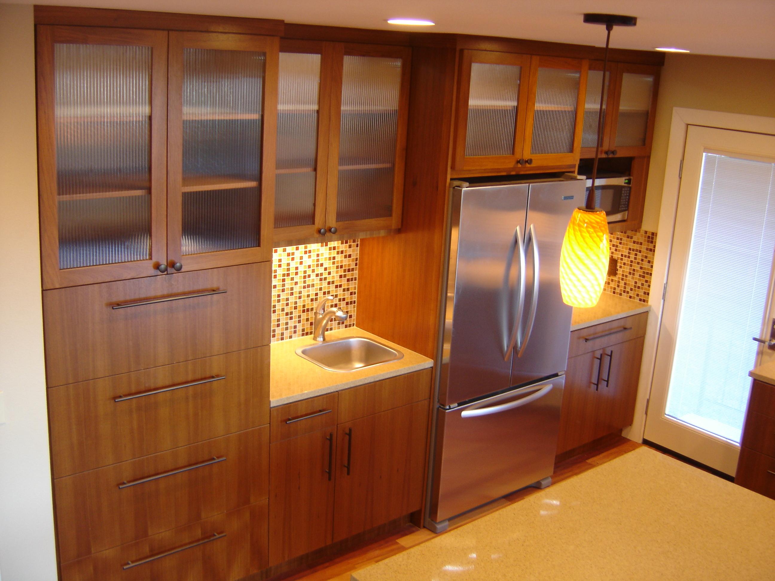 This is a teak kitchen overlooking  Astoria.