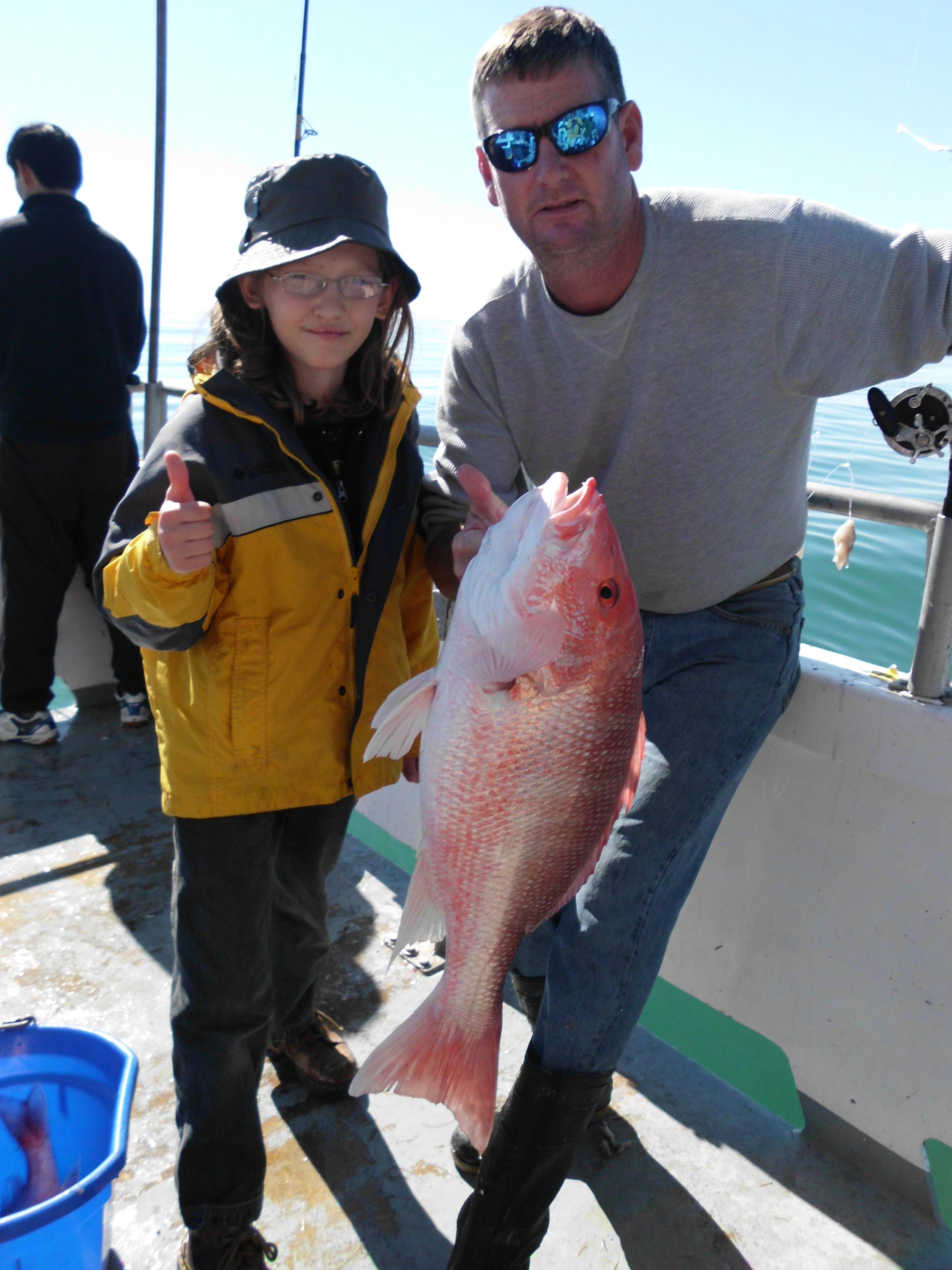 Captain Patrick Bringing in Those Snappers!