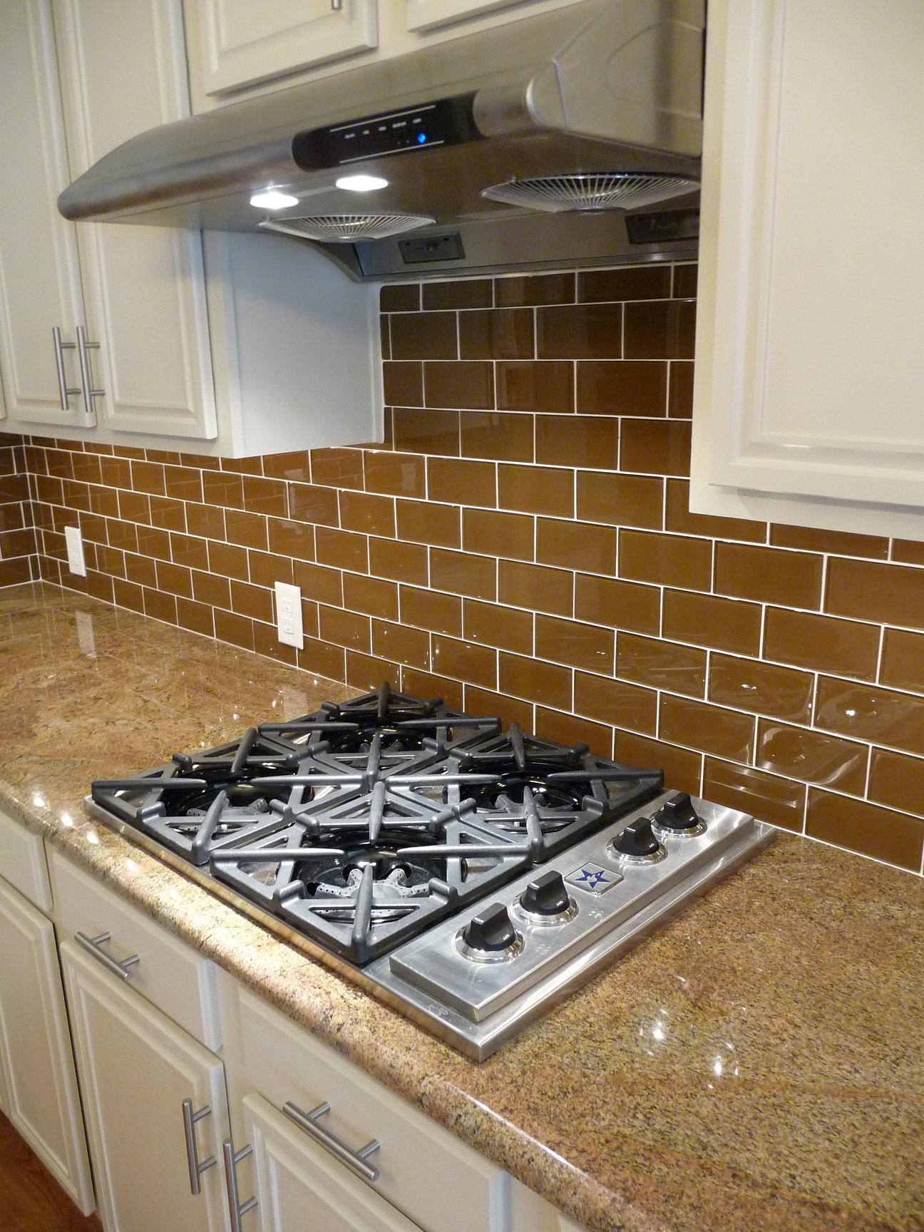 Juparana Arandis Granite Countertops w/Glass Tile Backsplash