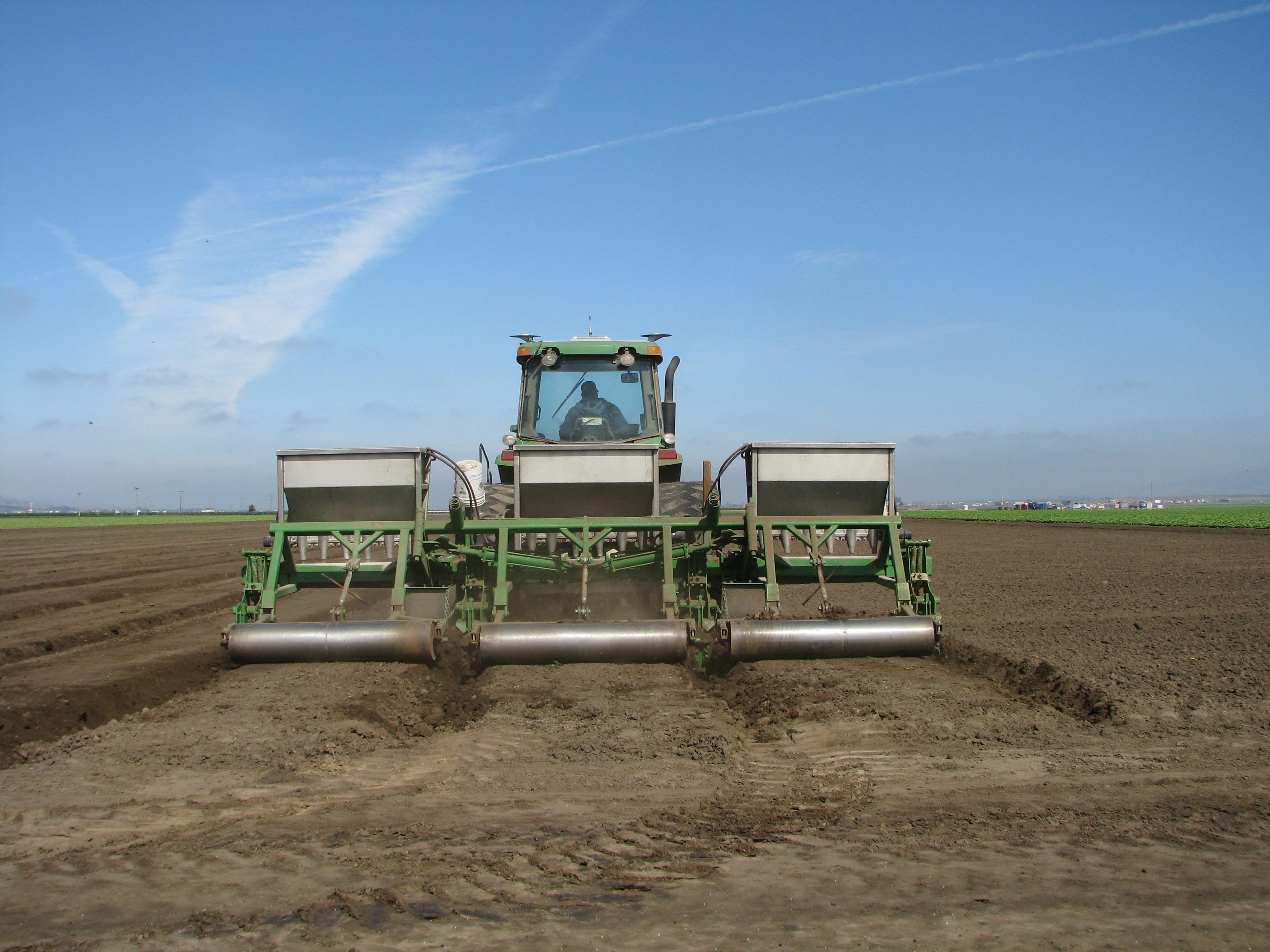 Preplant Listing Dry Fertilizer with our custom fabricated 3 bed 80" lister with rollers