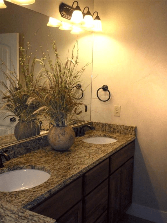 Choose granite in the same color pallet to achieve a calming, spa-like effect.