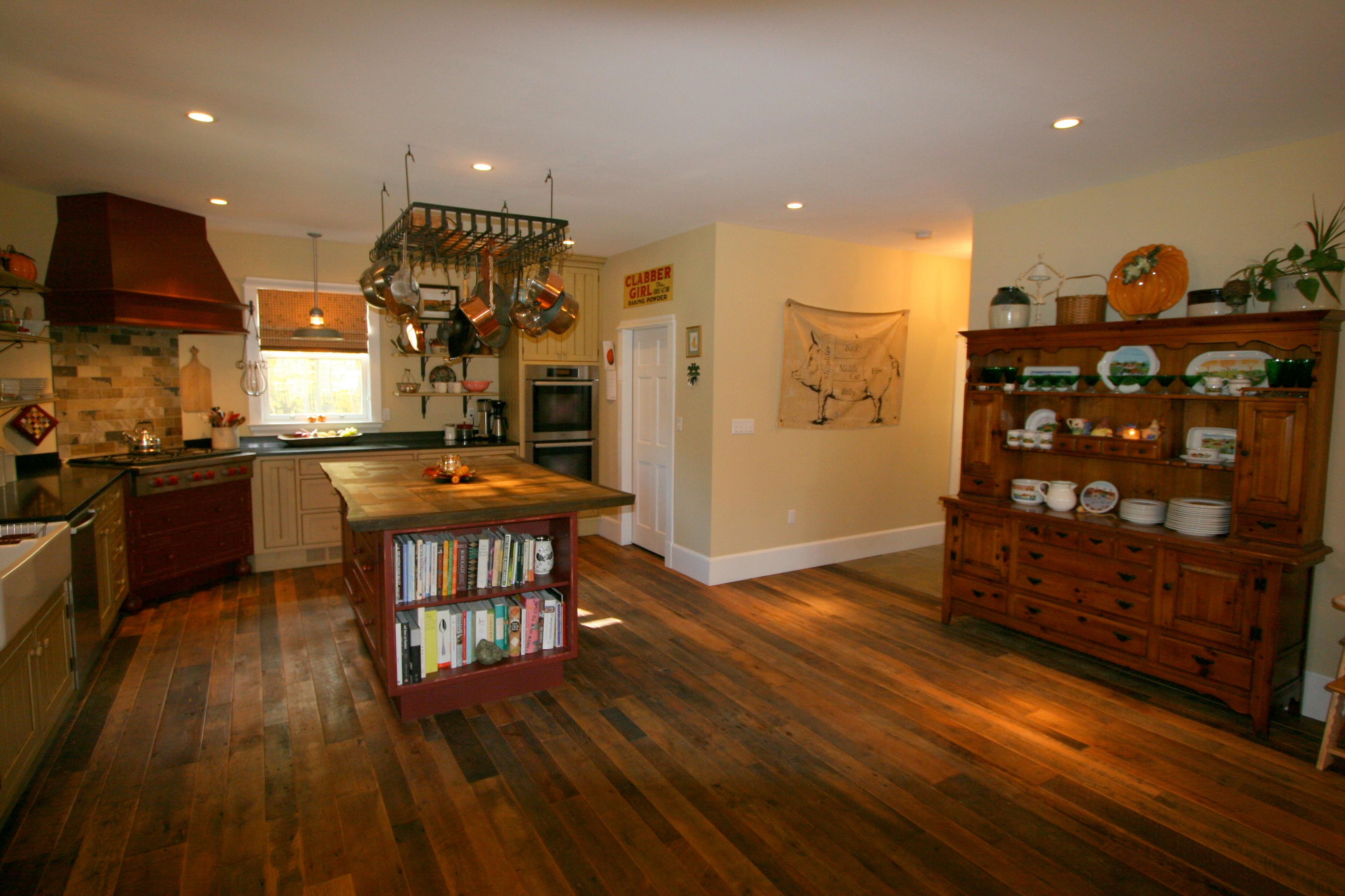 reclaimed oak flooring and custom island countertop