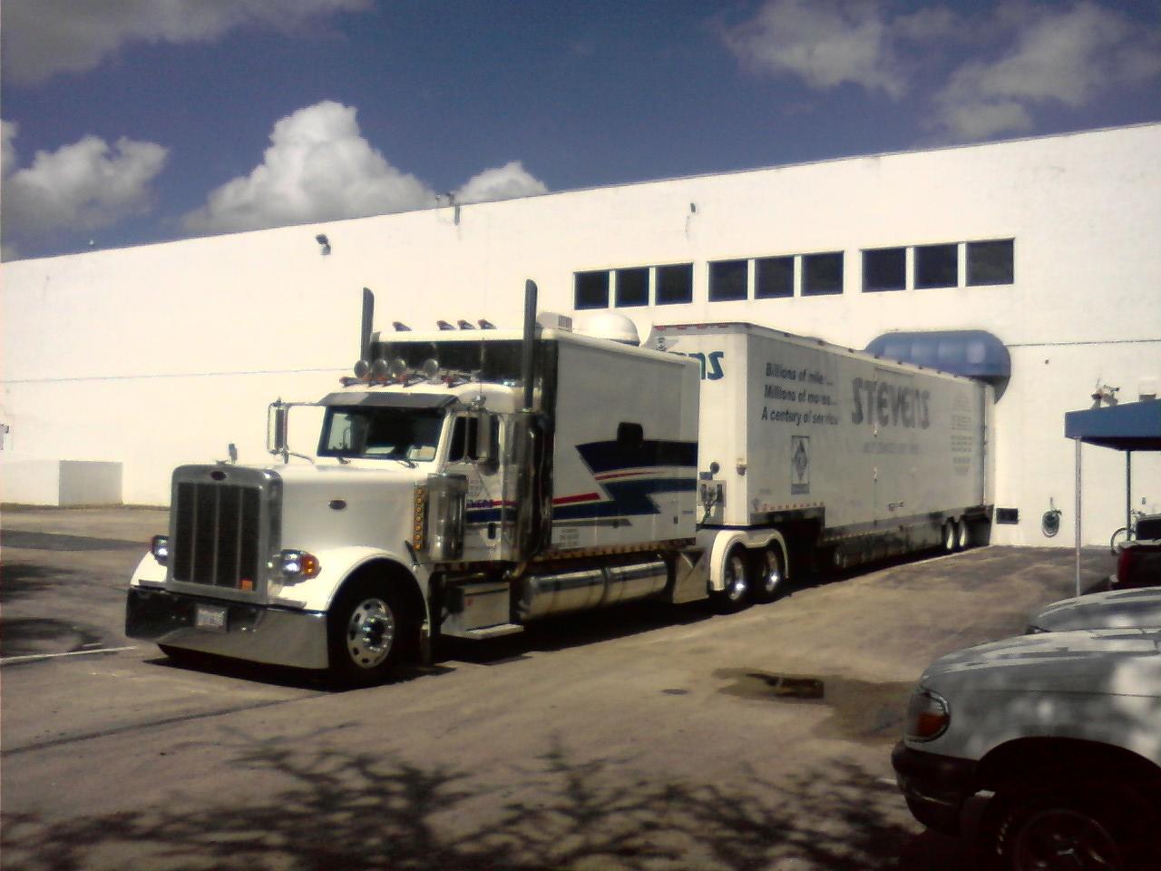 Cousins USA Warehouse with Moving van loading