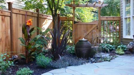 Fence and blue stone patio