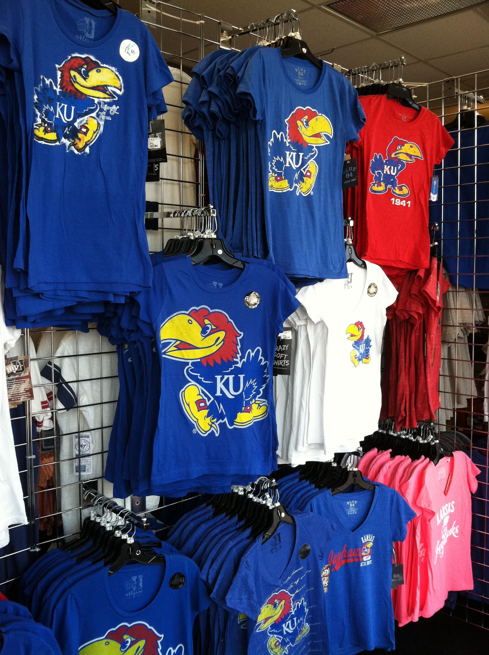 We have plenty of Kansas Jayhawks t-shirts, KU tank tops, Jayhawk hats, Kansas shorts and any KU fan apparel you might need!