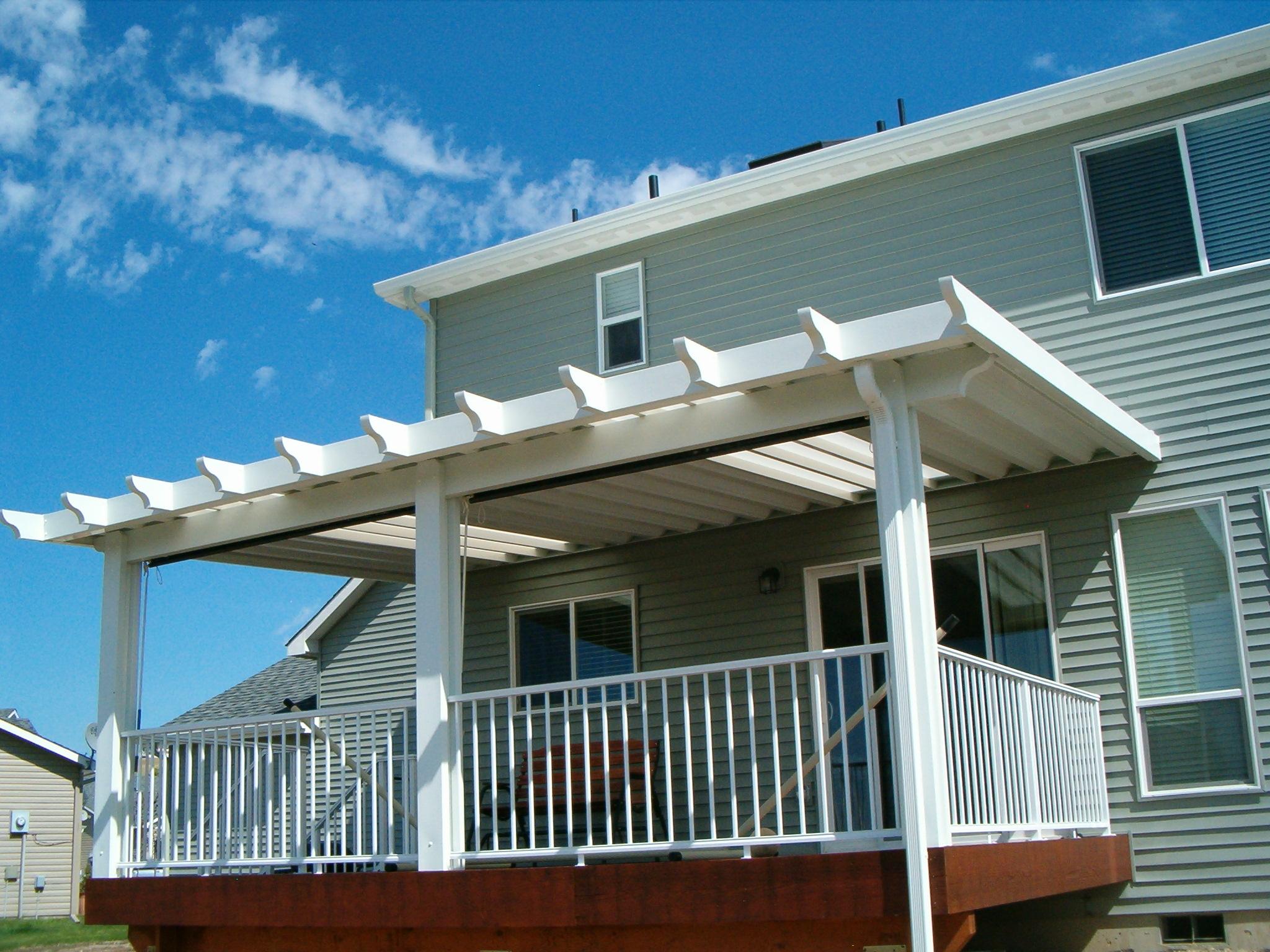 Solid pergola deck cover with lexan skylights