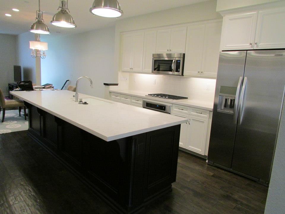 Custom coffee island and white kitchen cabinets