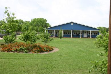 Beautifully landscapped grounds welcome guests to Birds of Paradise Inn