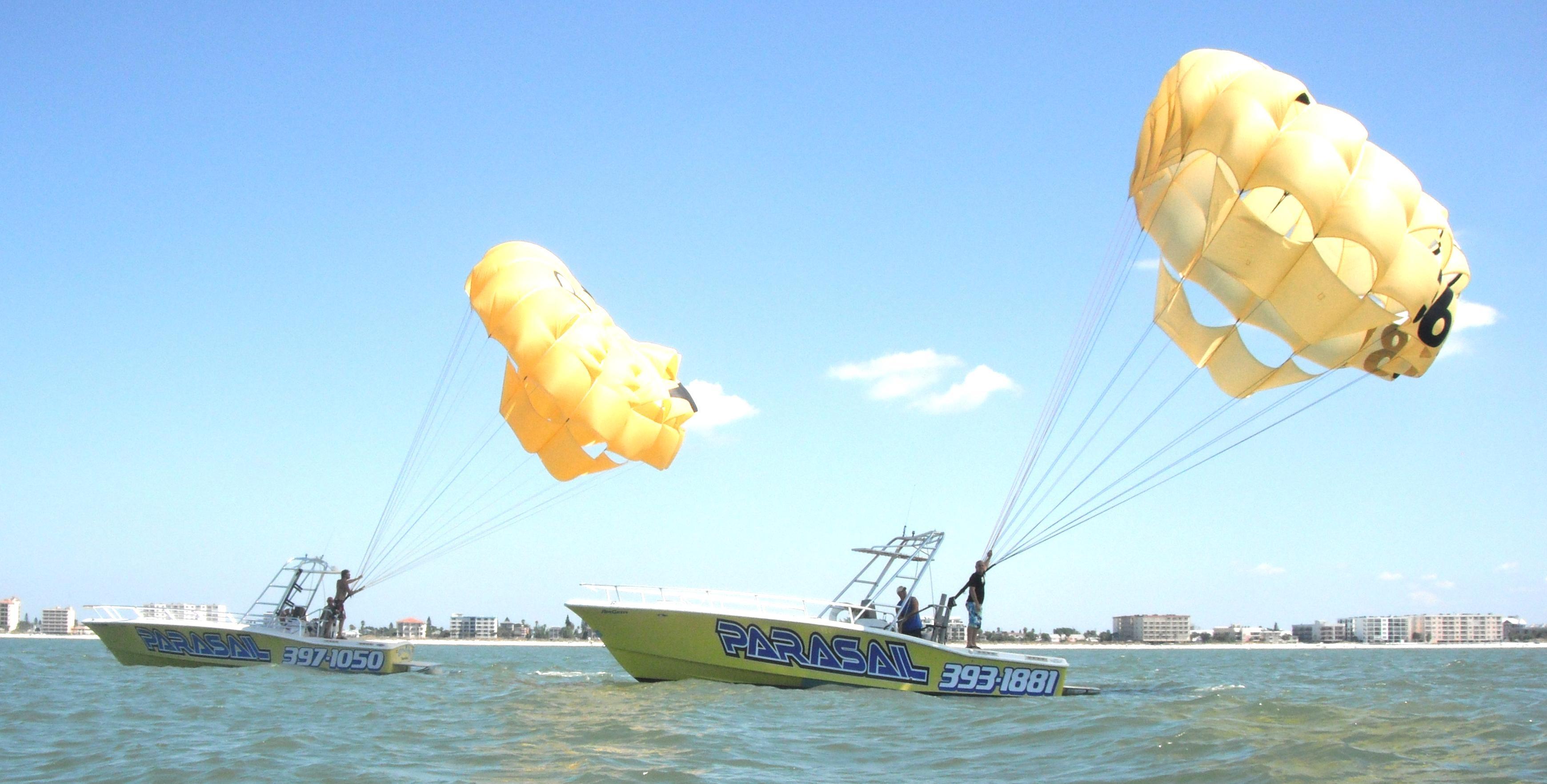 Two 12 passenger US Coast Guard inspected parasailing boats at Gators Parasail in Madeira Beach at Johns Pass