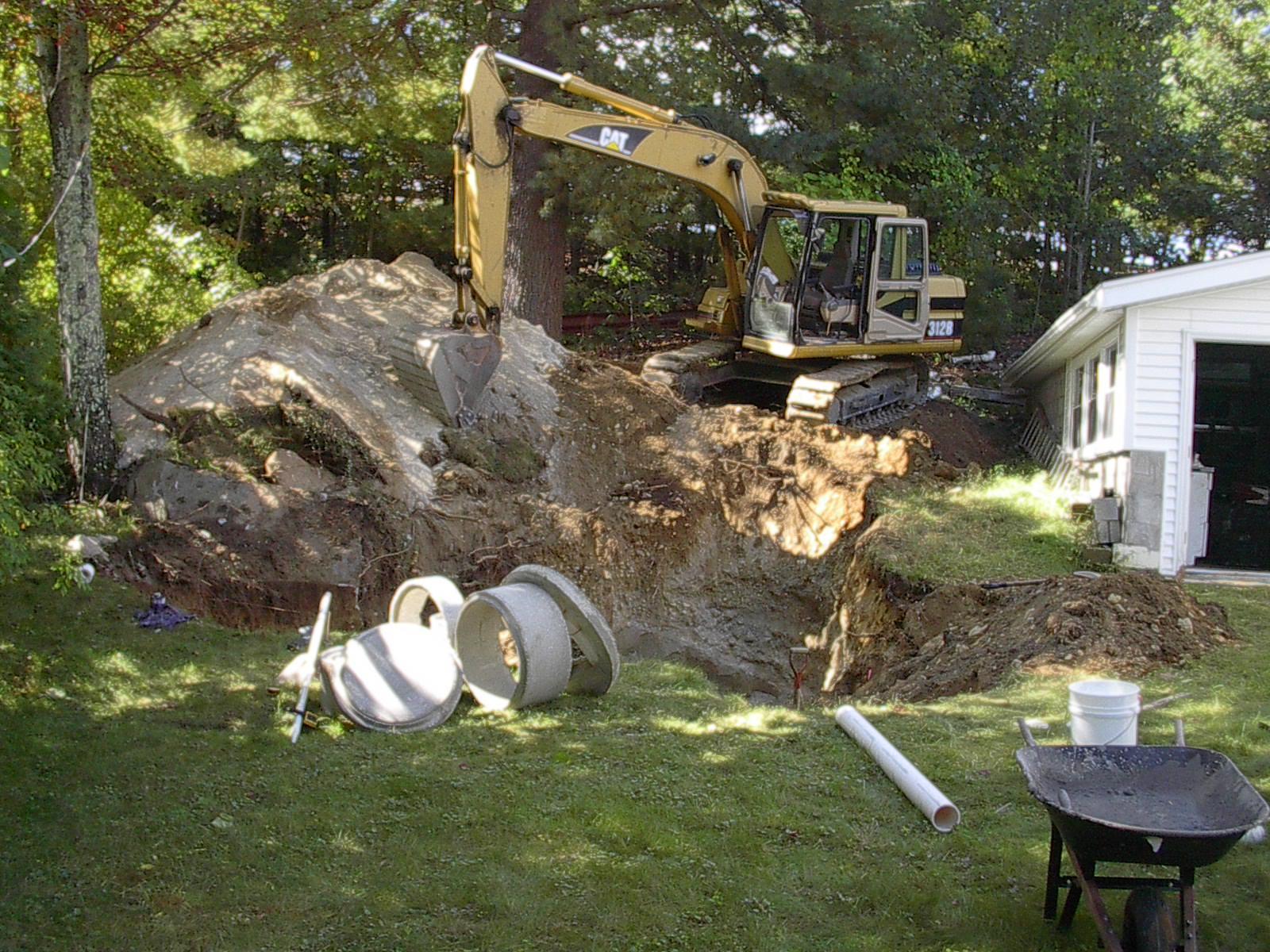 Phil's Excavating installs drainage tank