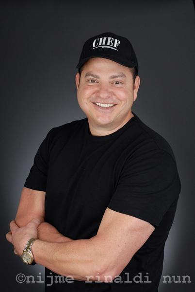 Chef Joe Hanna of Hanna Brothers Catering; studio portrait.