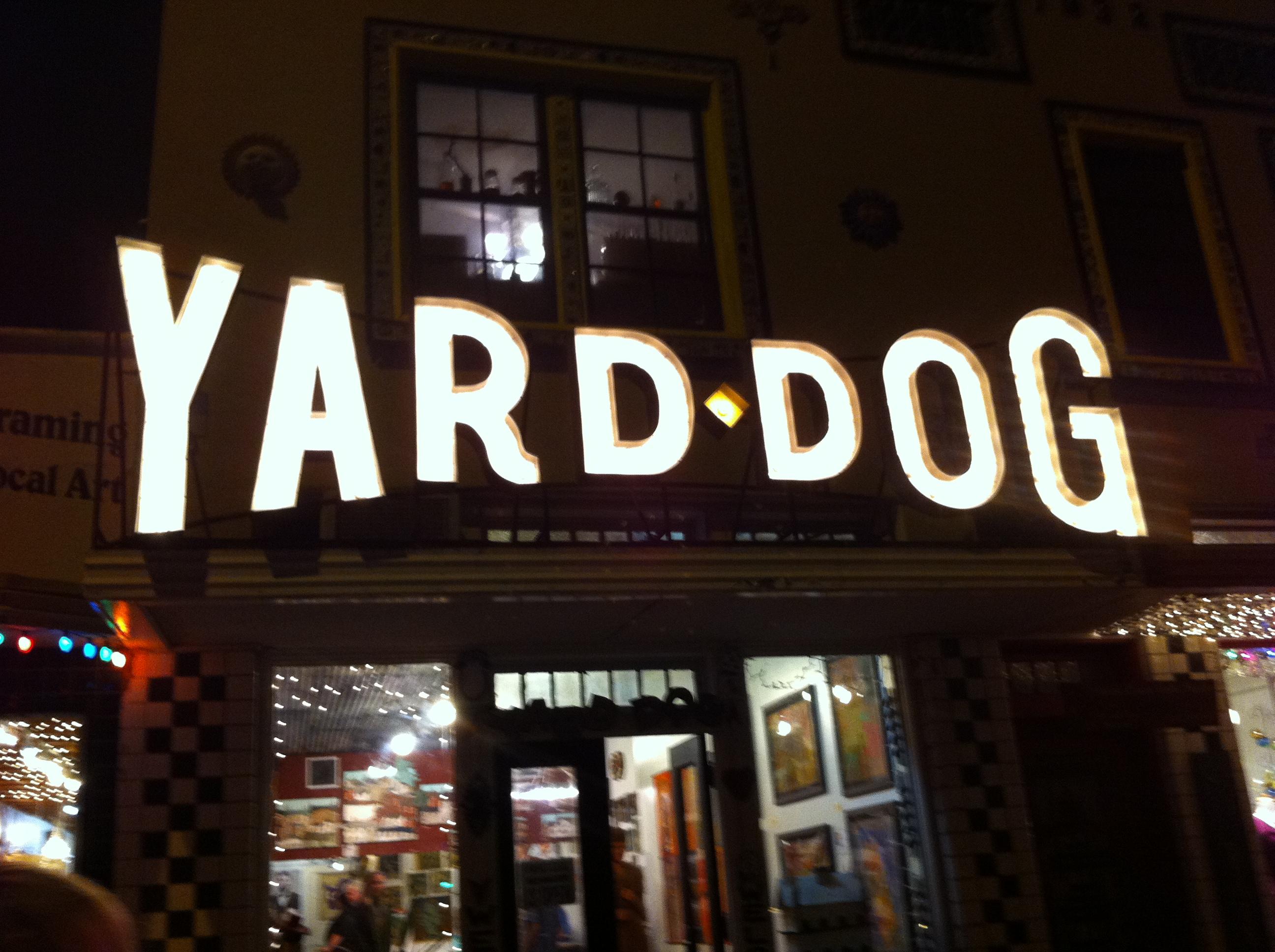 Yard Dog storefront at night