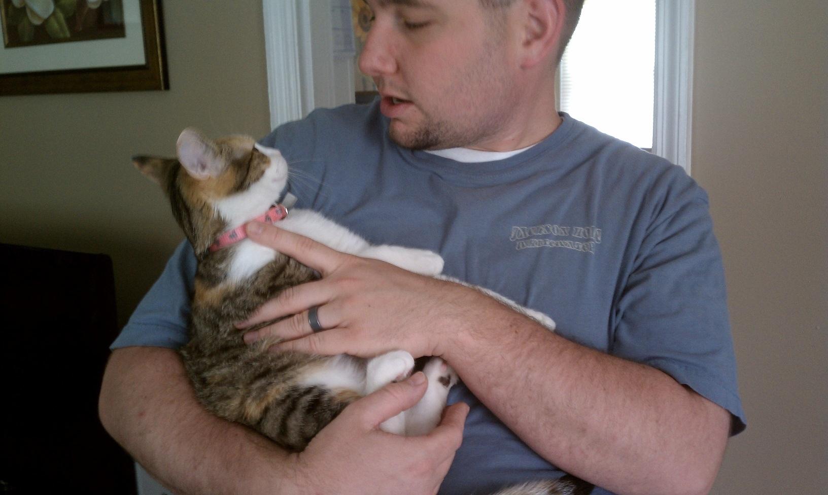 Jon, one of the owners, and a petsitter, with Kiki.