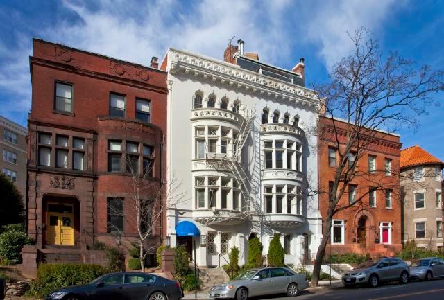 White Building w/ Blue Awning