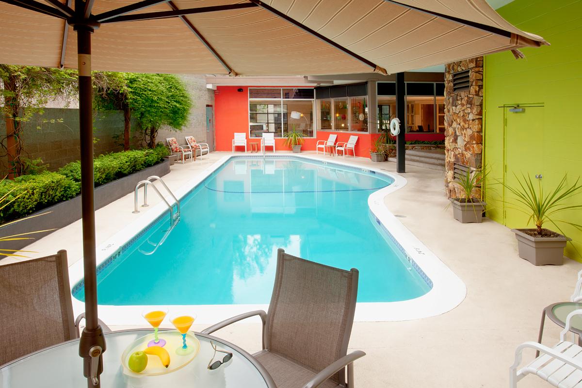 Outdoor Seasonal Swimming Pool at University Inn