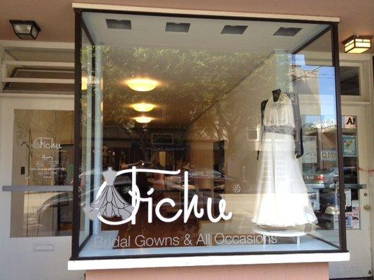 Store front, custom made wedding gown