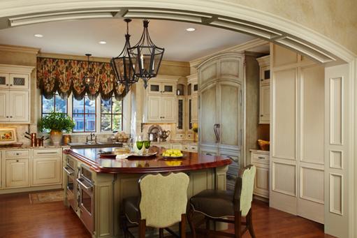 Decorative refrigerator door panels echo the surrounding architectural elements.