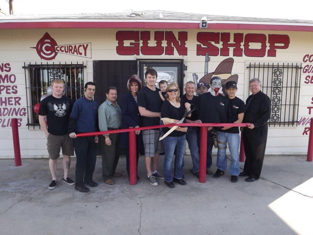 Accuracy Gun Shop 40 year celebration with a ribbon cutting ceremony with the Chamber of Commerce