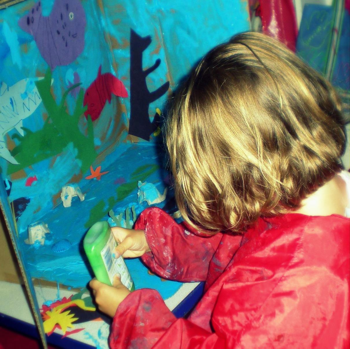 Creating an ocean at Rockville Community Nursery School, a parent participation preschool