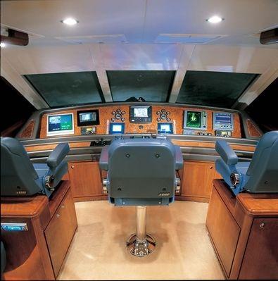 STIDD Systems - This Bertram 630E Enclosed Bridge features a pair of box mounted STIDD 500Ws, plus a 500XL-1X2 Deluxe Chrome Admiral at the forward helm station.