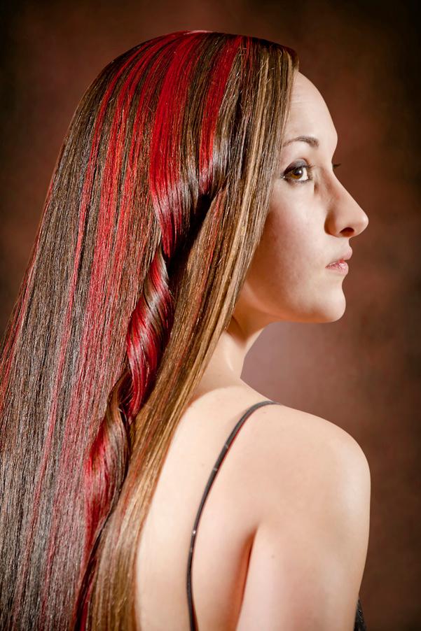 Long brown hair with red highlights