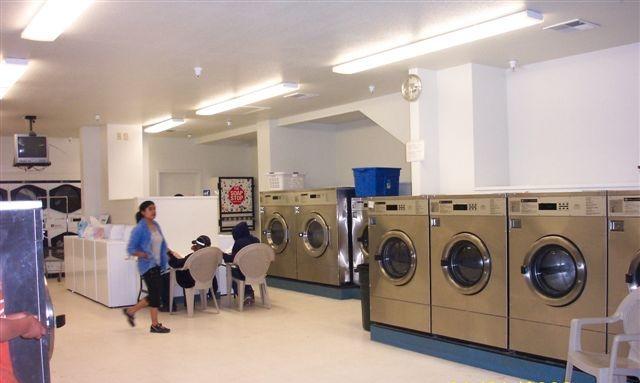 Shot of the triple and quadruple load washing machines at Watsonville CA laundromat PJ's Wash