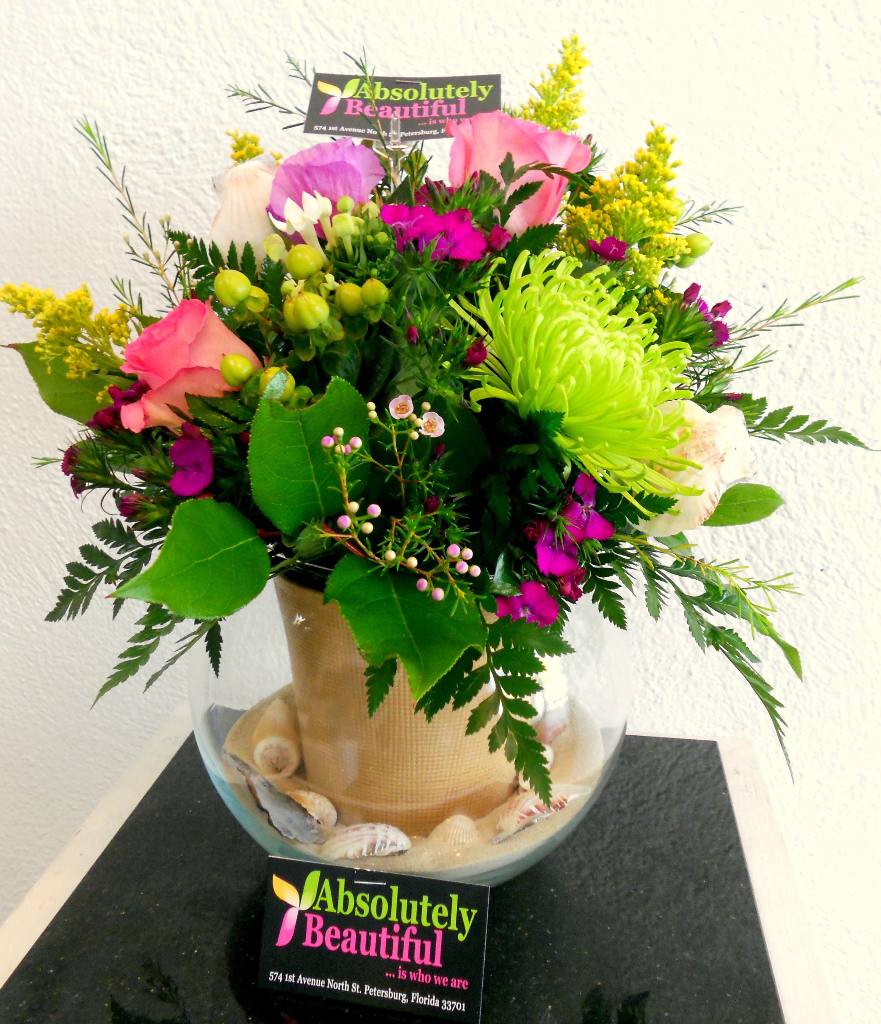 Absolutely Beautiful Flowers  This Shell Beach Bubble Glass Bouquet will meet your Spring or Summer Break needs with Spring or Summer seasonal flowers great for events or any occasion. Pick your own variety of flowers. This is an exclusive arrangement from Absolutely Beautiful Flowers! Contact our Flower Shop at (727) 470-5825 or order online 24/7!http://www.absolutelybeautiful.us $59.99 St Petersburg FL Florists (727) 470-5825