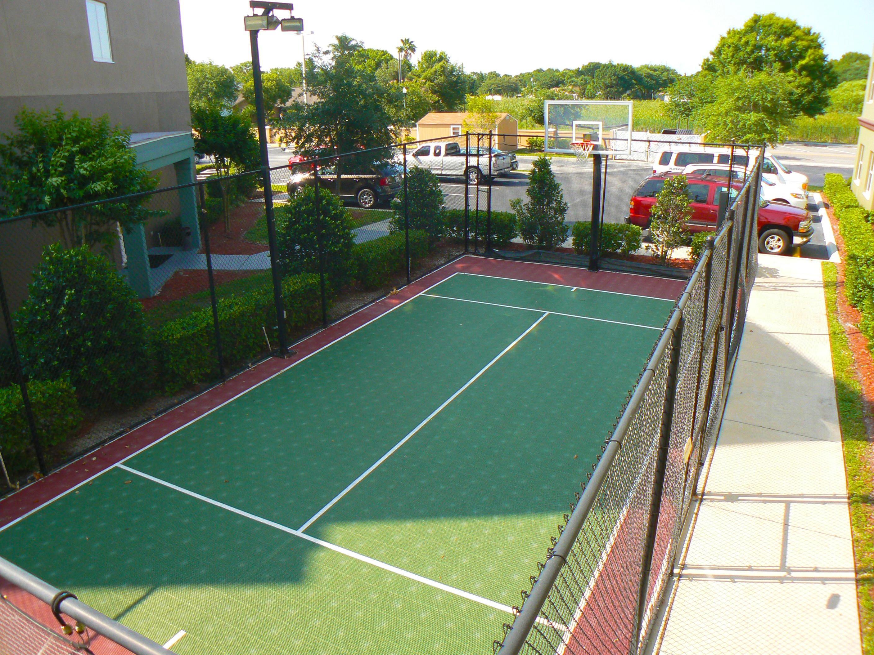 Enjoy our well-lit Sport Court. Equipment is available at the front desk.