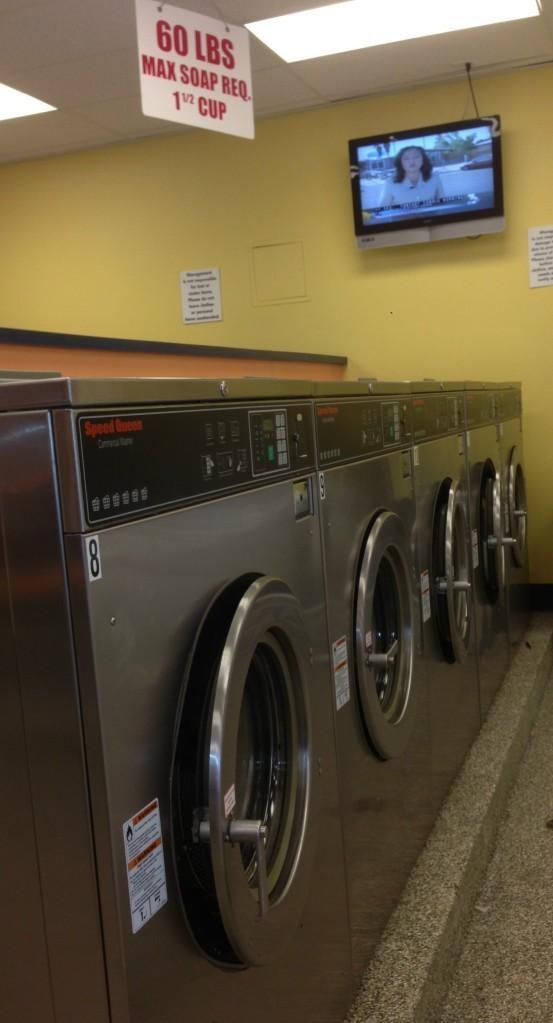 Falt screen TVs to watch while doing your laundry!