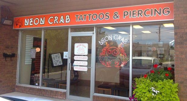 Neon Crab Tattoos & Piercing