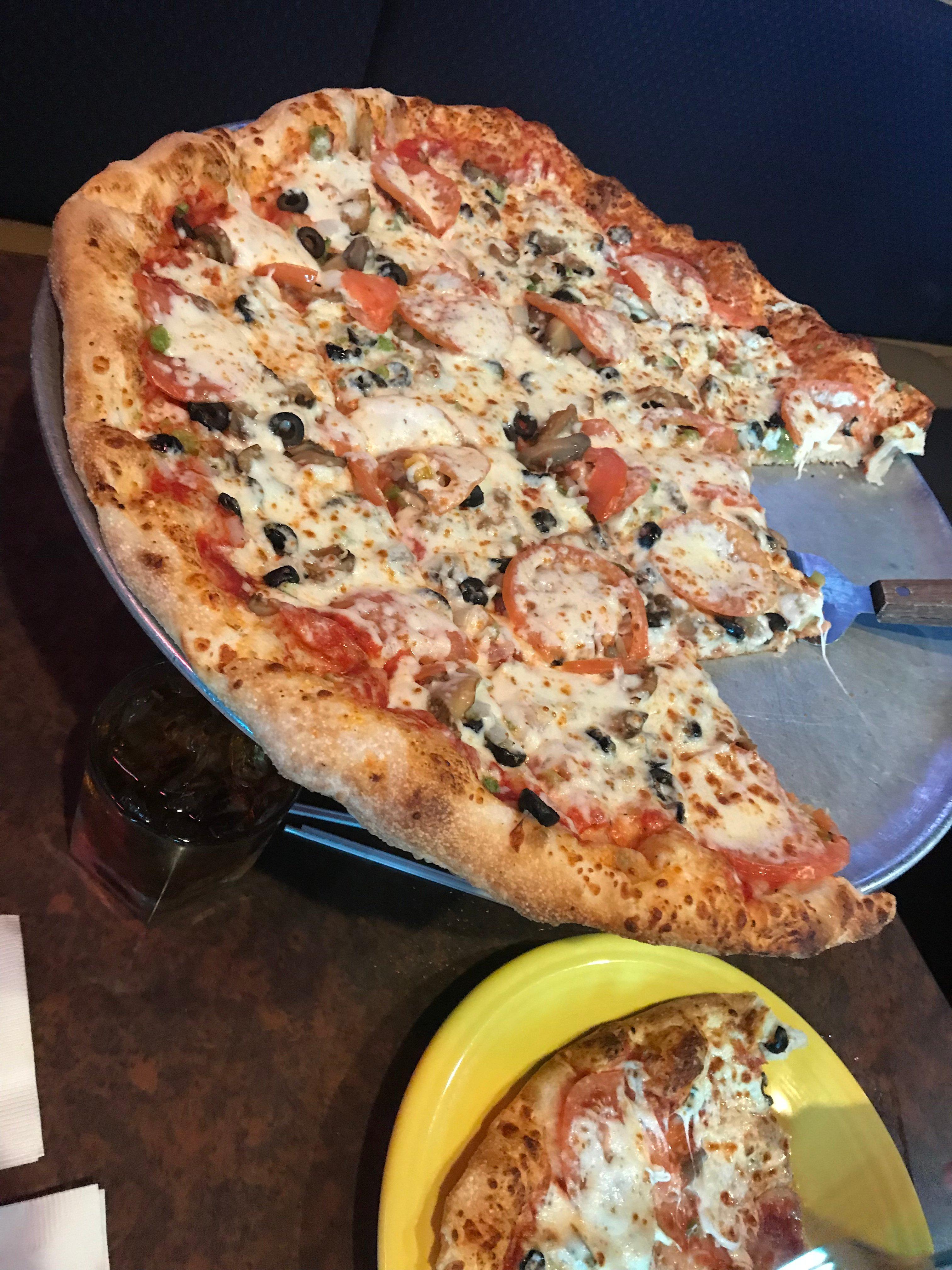 Varsity Sports Cafe & Roman Coin Pizza