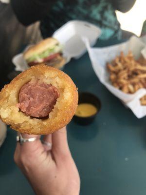 Corn dog was crunchy outside, fluffy and juicy inside.