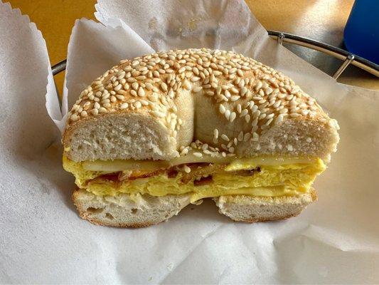 Sesame bagel with bacon, egg, and cheddar cheese! (Half, I ate the other half too quickly to capture a picture lol)