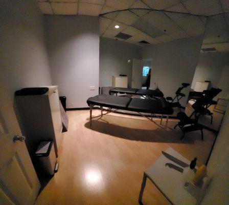 Our room with the massage chair and the treatment table located at Flex Gym