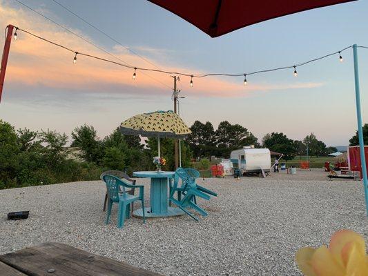 Surrounded by other food trucks and a beautiful seating area