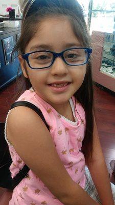 Baby girl getting her new pair of glasses soon.