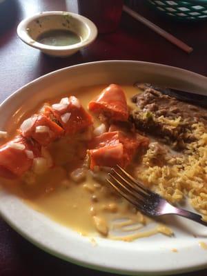 Last of the chicken enchiladas with beans and rice