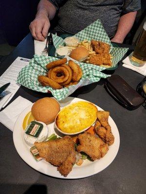 Fish and chips, mine with Mac N Cheese, sharing a nice order if tasty Onion Rings :p