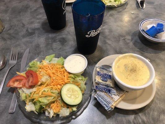 This huge side salad and soup comes with your dinner.