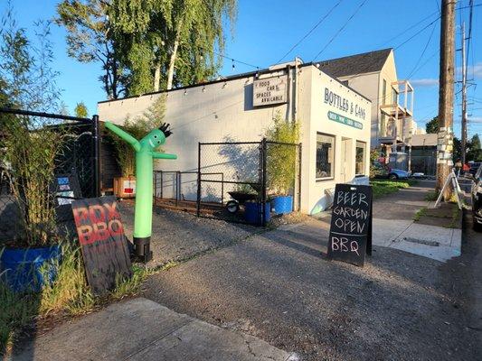 Frontage of shop and entrance to patio/carts