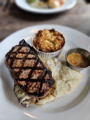 12oz New York Strip, mashed potatoes, and smoked gouda Mac and cheese