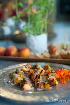 Grilled serrano ham wrapped peaches