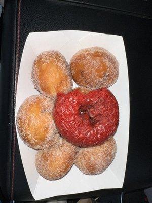 Red velvet cake donut and large cinnamon sugar donut bites