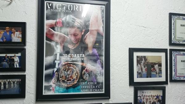 Invicta champ & ufc strawweight, Jessica Penne.  A black belt under Lucas Leite.