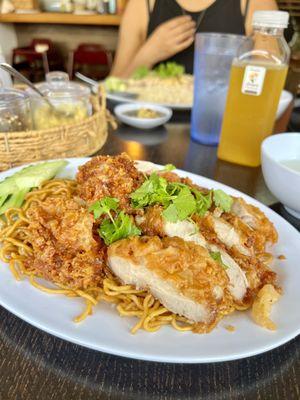 half fried chicken and fried pork with garlic noodles