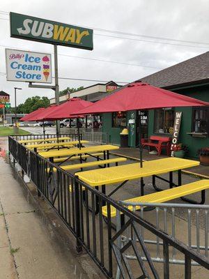 This is our picnic area with 4 tables and umbrellas.