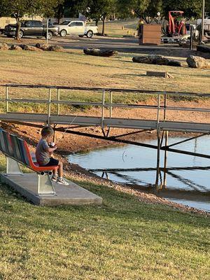 Little guy fishing, soooo cute.