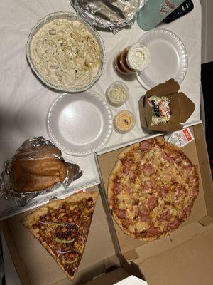 Hawaiian pizza and chicken Alfredo and the New York slice pizza barbecue chicken no pizza two big garlic bread, toasted, and salad