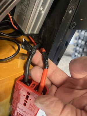 Electrical tape on battery cable